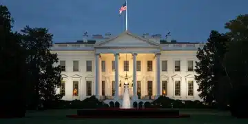 White House at dusk, symbolizing the new 2026 presidential administration and upcoming policy changes.